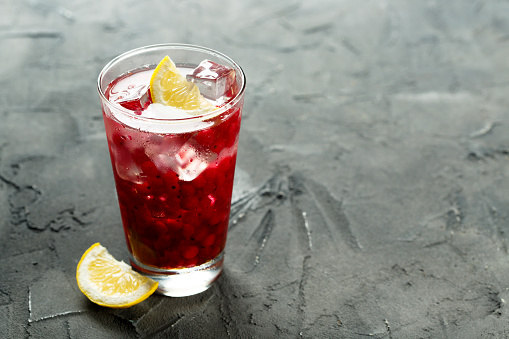 Red currant cocktail with lemon and honey
