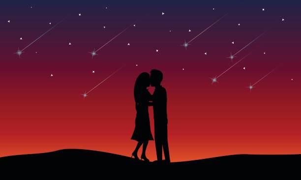 istock Loving couple kissing among meteor shower 672401714