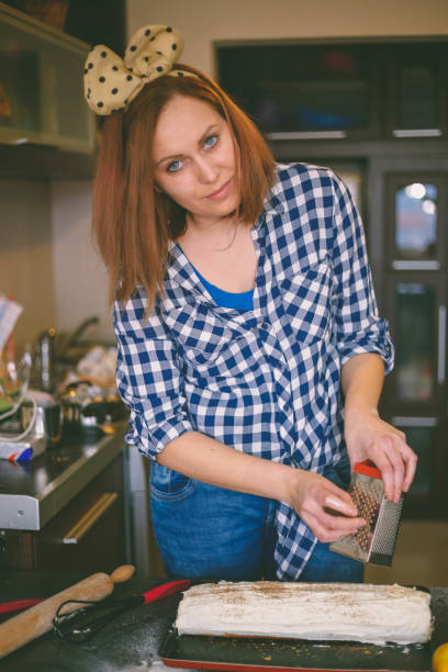 istock Young woman in the kitchen 672402210