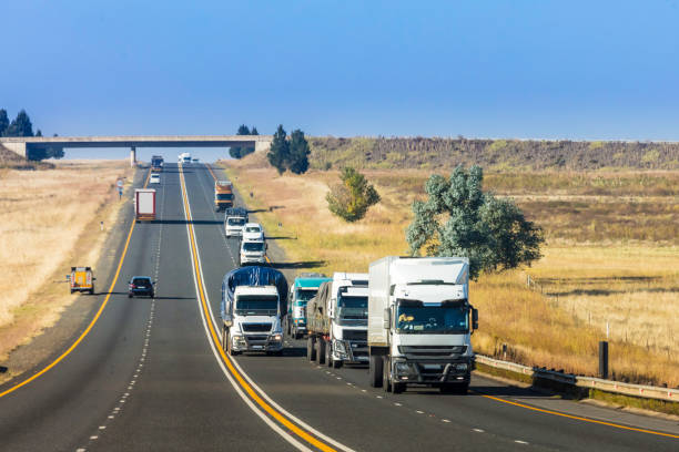 istock Heavy Cargo on the Road transporting various goods 672418632