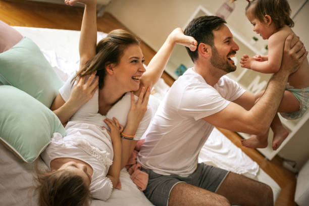 istock Happy family having fun at home. 672419336