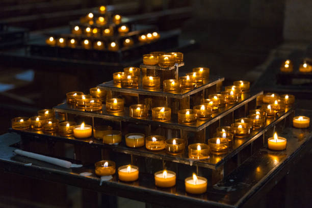 istock Many burning candles with shallow depth of field. 672419452