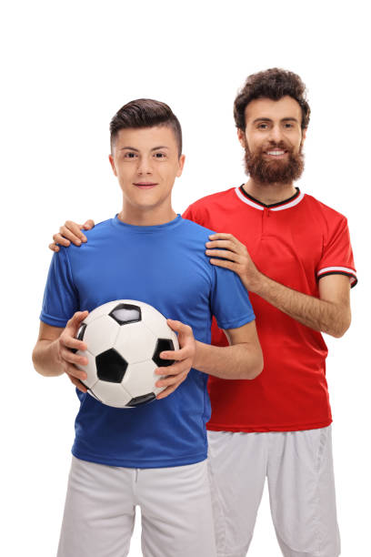 istock Proud father with his son dressed in sport jerseys 672421820