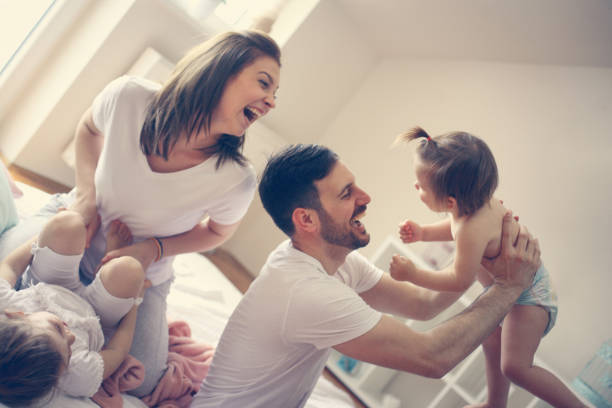istock Happy family having fun at home. 672422054