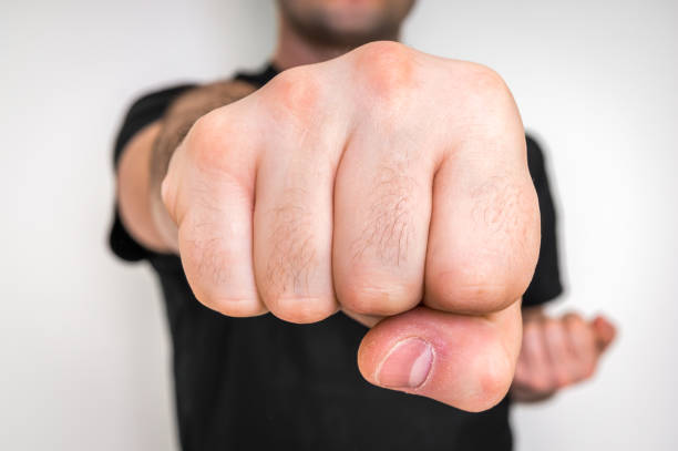 istock Young boxer showing punch a fist 672432982