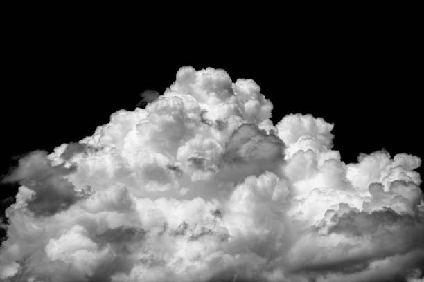 istock Close-up cumulus cloud isolated on black background 672433700