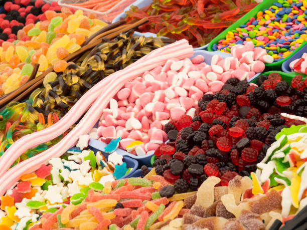 istock Close up of candies assorted  colors background 672436176