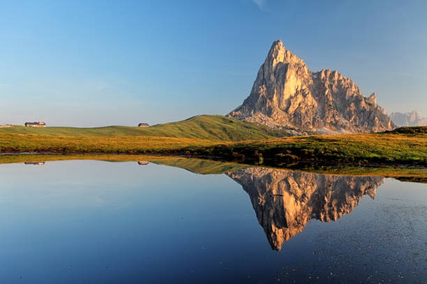 istock Passo Giau and Cima ra Gusela in lake reflection, Dolomites - Italy 672436794