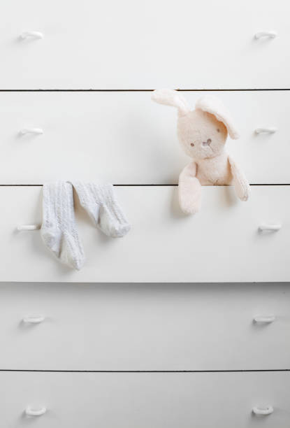 istock Open shelf of white chest 672438802