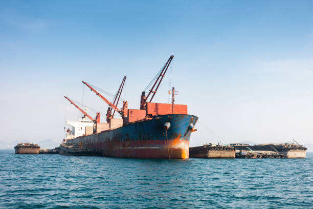 istock Shipping unloading truck in the ocean. Business transportation. 672445366