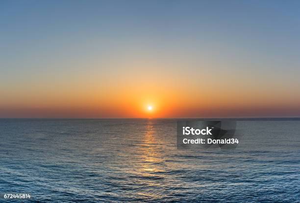 Sunrise Stock Photo - Download Image Now - Sunrise - Dawn, Sea, Dawn