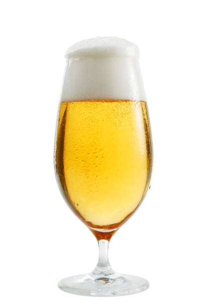 A glass of beer exposed in front of white