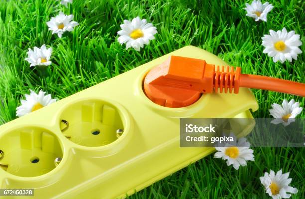 Socket Strip With Orange Plug Stock Photo - Download Image Now - Electrical Outlet, Solar Energy, Electricity