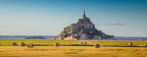istock Le Mont Saint-Michel at sunset, Normandy, France 672459430