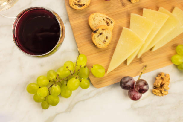 istock Glasses of red and white wine at tasting 672460930