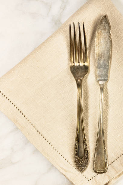 istock Overhead photo of vintage fork and knife with copyspace 672463368
