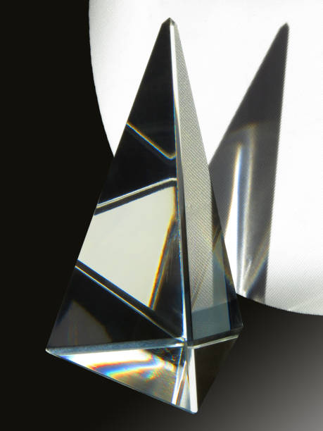istock Prism made of glass casts a shadow 672469172