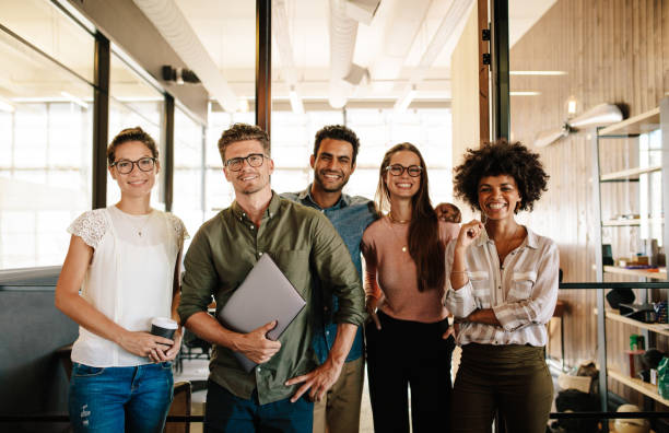 istock Portrait of successful creative business team 672474652