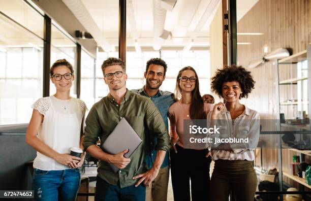 Portrait Of Successful Creative Business Team Stock Photo - Download Image Now - Group Of People, Teamwork, Young Adult