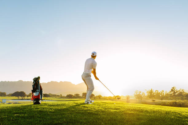 istock Professional male golfer taking shot on golf course 672481502