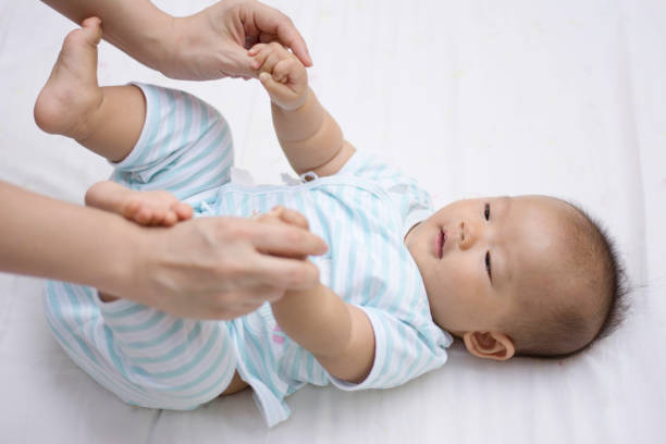 istock cute baby enjoy playing with mother 672481764