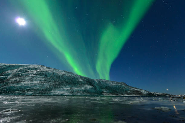 istock Aurora Northern Polar light in night sky over Northern Norway 672490686
