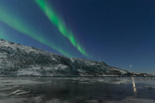 istock Aurora Northern Polar light in night sky over Northern Norway 672496248