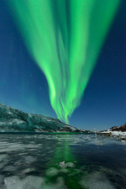 istock Aurora Northern Polar light in night sky over Northern Norway 672496358