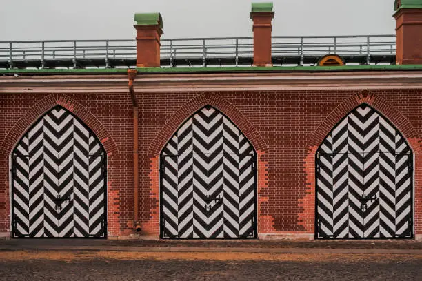 Photo of Warehouse gates in Peter and Paul Fortress, the original  citadel of St. Petersburg, Russia, founded by Peter the Great in 1703