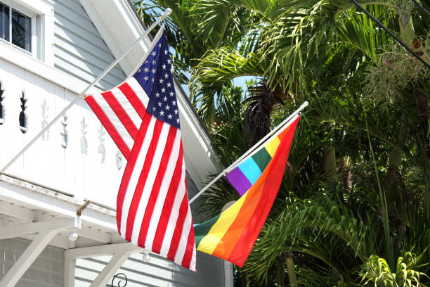 istock American  flag and rainbow flag 672502184