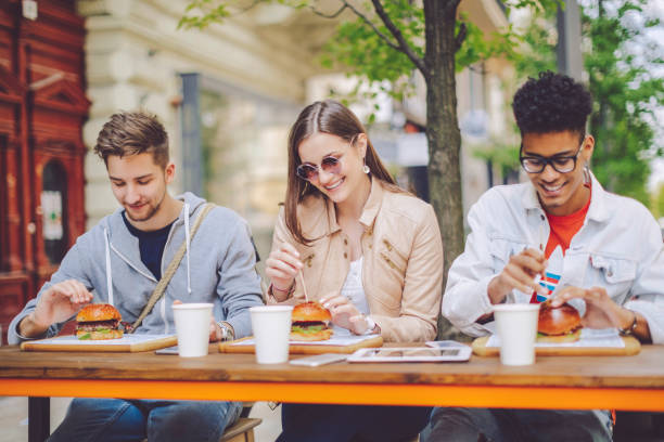 istock Friends spending time together in the city 672502890