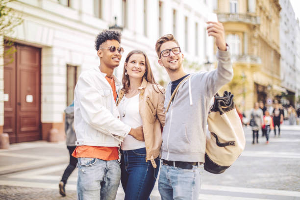 istock Friends spending time together in the city 672505962