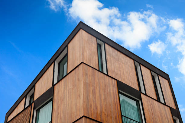 istock Wood facade on modern apartment house 672506050