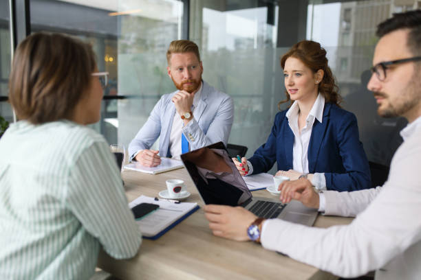 istock Group of business people brainstorming about innovative ideas 672506500
