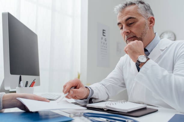 istock Doctor meeting with a patient 672506752