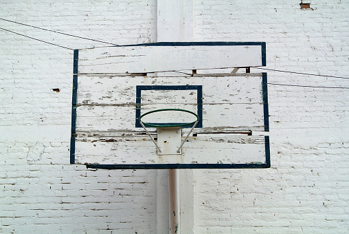 old backboard with basket to play basketball
