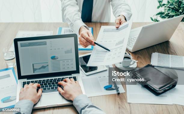 Business Partners In The Office Stock Photo - Download Image Now - Financial Report, Point of View, Personal Perspective