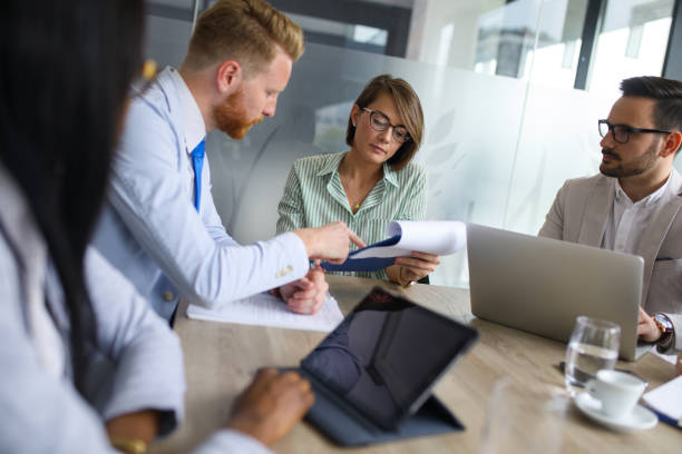 istock Group of business people brainstorming about innovative ideas 672521472