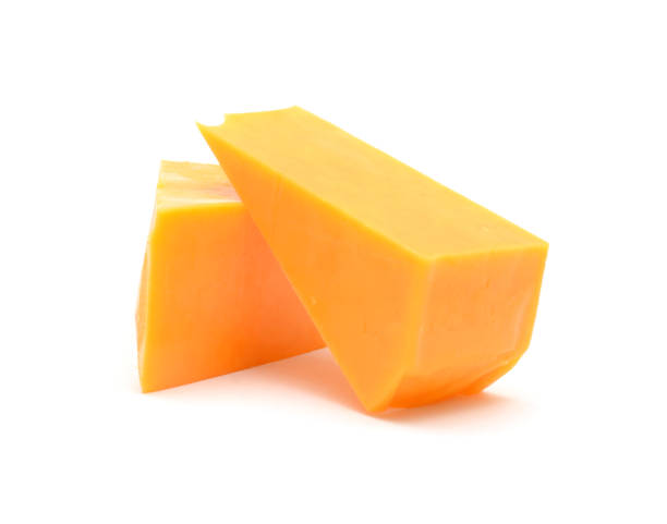 formaggio cheddar isolato su sfondo bianco - forma di formaggio foto e immagini stock