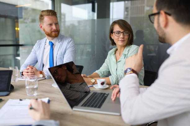istock Group of business people brainstorming about innovative ideas 672526864
