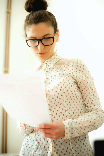 istock Young woman working in the office 672528522