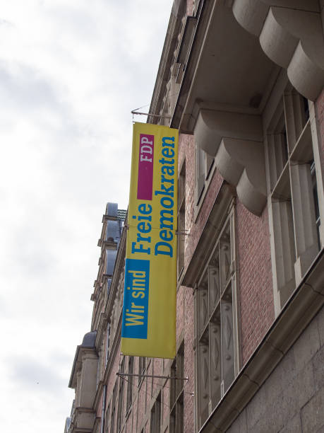 Berlin: FDP Flag At The National Office Of The Party At Hans-Dietrich-Genscher-Haus In Berlin Berlin: FDP Flag At The National Office Of The Party At Hans-Dietrich-Genscher-Haus In Berlin german free democratic party photos stock pictures, royalty-free photos & images