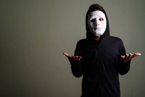 istock Studio shot of young Asian man against colored background 672532104