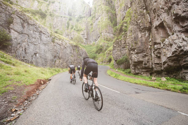 Three cylists attacking the climb in Cheddar Gorge, U.K
