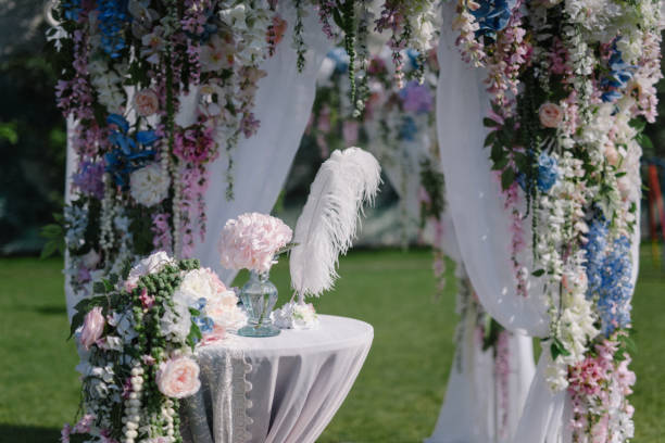 istock Outdoors wedding decoration with acacia garlands 672552276