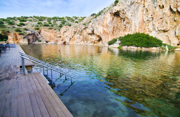 Vouliagmeni lake Greece - known for its constant temperature all the year stock photo