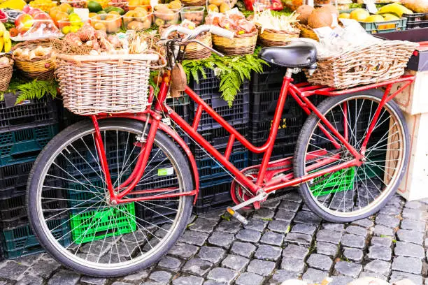 Photo of Fruit market with old bike in Campo di fiori in Rome