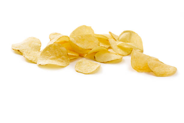 istock Crispy potato chips isolated on white background  close-up 672559694
