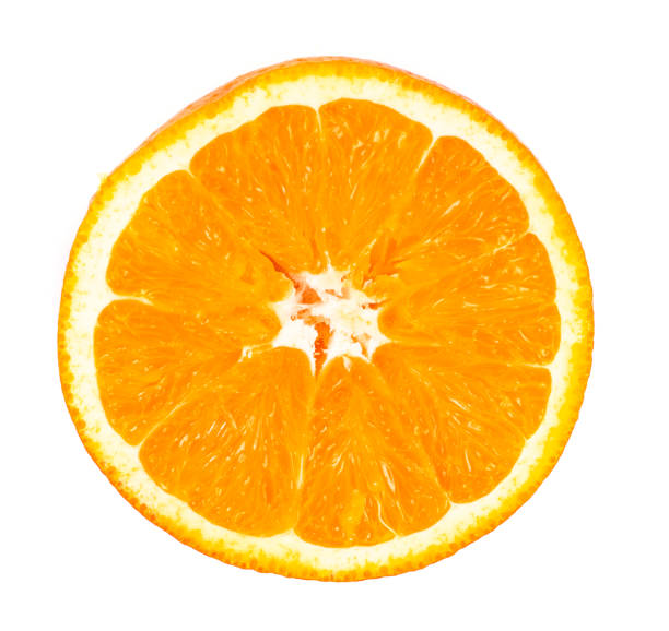 istock Half of orange isolated on white background 672563218