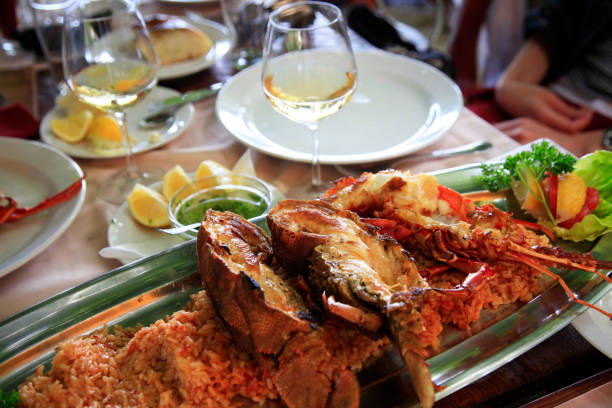 istock Lobsters on a plate with rice in restaurant 672574674